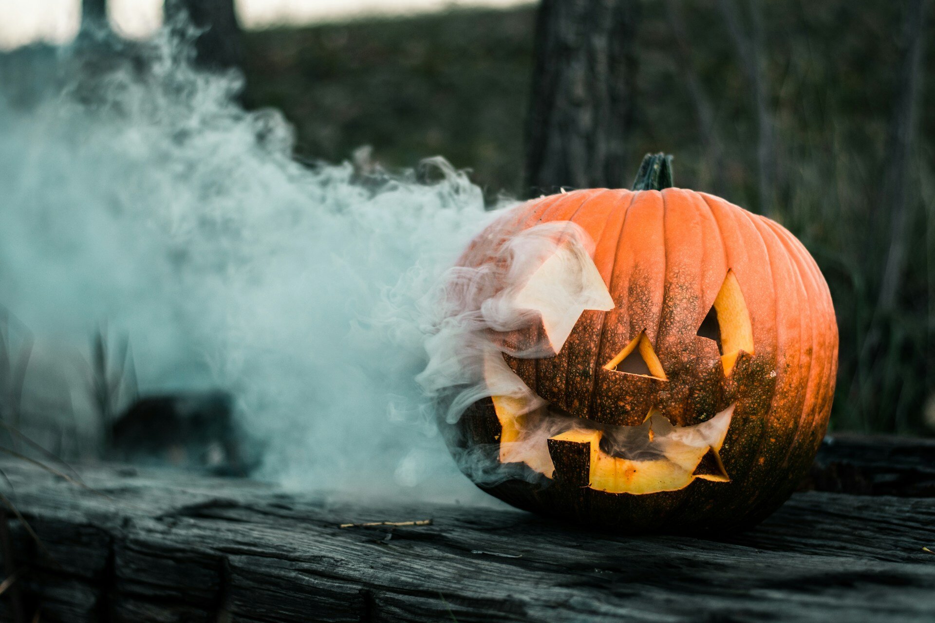 pumpkin with smoke on ledge